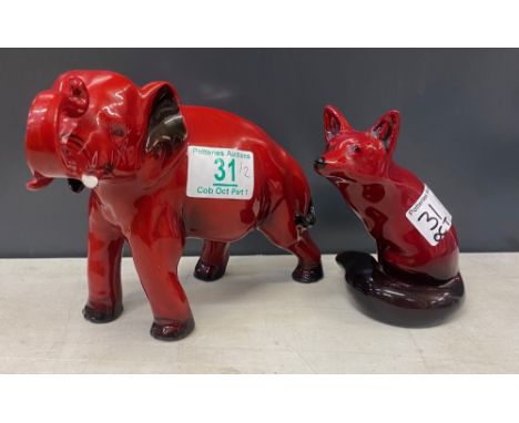 Royal Doulton Flambe Elephant (1 tusk a/f) together with Flambe seated fox (2)