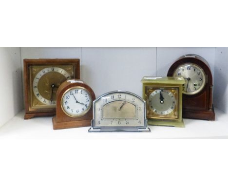 Five Clocks, including Edwardian Domed examples, Art Deco Chrome Mantle Clock and Square example and an Onyx Elliot Clock (5)