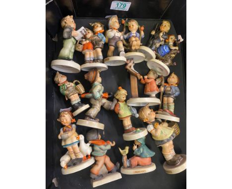 A Collection of Fifteen Hummel Porcelain Child Figures