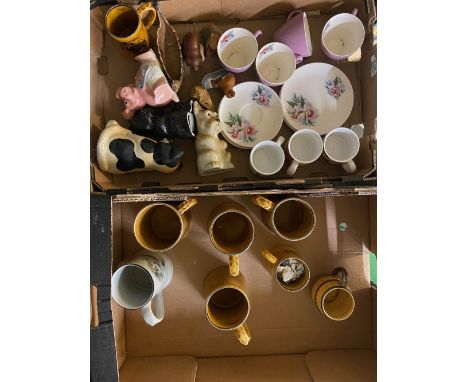 A collection of Wade items to include large Tankards, money boxes &amp; part tea set etc 23 items (1 tray)
