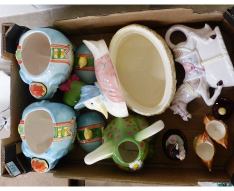 A collection of novelty ceramic items to include two lidded novelty elephants and tea pot, large Beatrix Potter Encesco Jemim