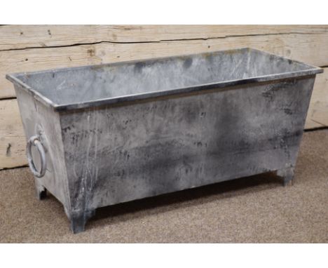 Rectangular lead finish tapered garden planter with ring handles, W81cm, D36cm, H36cm Condition Report Click here for further