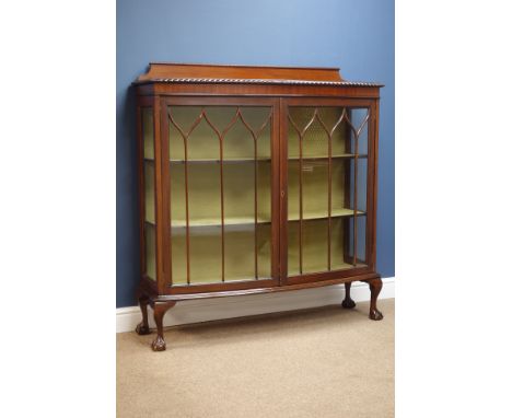 Early 20th century bow front mahogany display cabinet, two astragal glazed doors, on ball and claw feet, W122cm, H131cm, D37c