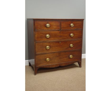 Early 19th century mahogany chest, rectangular cross banded top above two short and three long drawers, shaped apron with spl