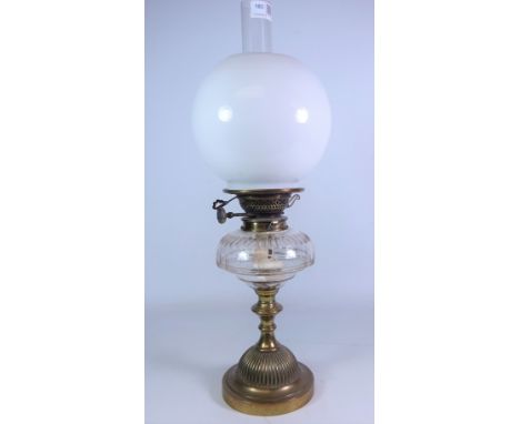 Victorian brass oil lamp with cut glass reservoir, opaque glass shade and funnel, H55cm    Condition Report   Click here for 