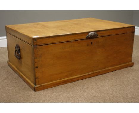 Waxed pine travelling trunk with hinged lid, metal carrying handles, W91cm, H35cm, D60cm Condition Report Click here for furt
