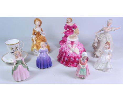 Seven Royal Doulton figurines; Tootles HN1680, Marie, Kerry, Sandra, Victoria, Jennifer, a Wedgwood figurine and a Royal Worc