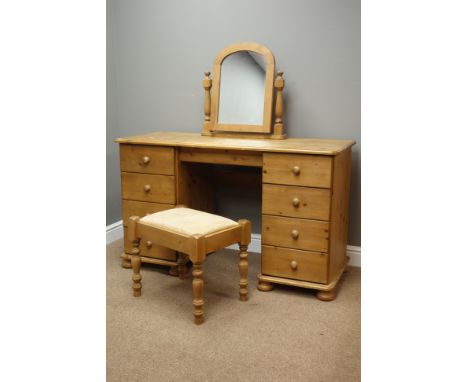 Pine twin pedestal dressing table, eight drawers, with stool and mirror, W127cm, H76cm, D51cm Condition Report Click here for