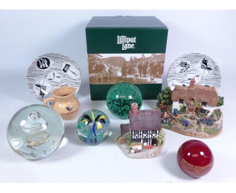 Four glass paperweights, two 1950's Ridgeway 'Homemaker' saucers and two Lilliput lane cottages 'Waters Edge' with box and on