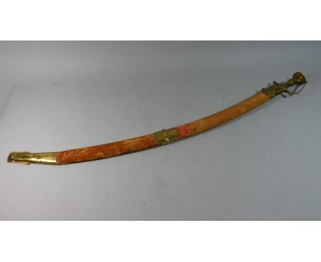 A Brass Mounted Indian Cutlass with Engraved Blade and Brass Mounted Scabbard, Total Length 97cm 