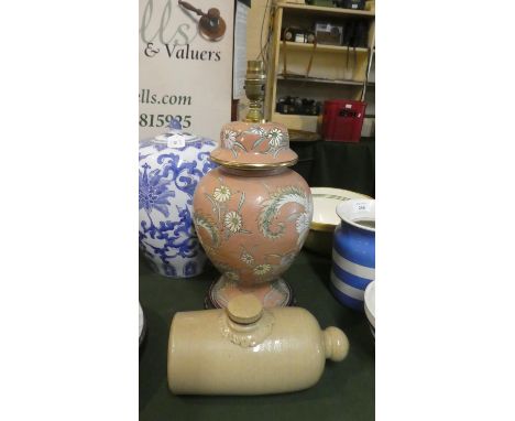 A Ceramic Table Lamp and a Stoneware Hot Water Bottle 