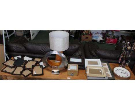 A selection of modern decorative items to include picture frames, lamp, clock, etc