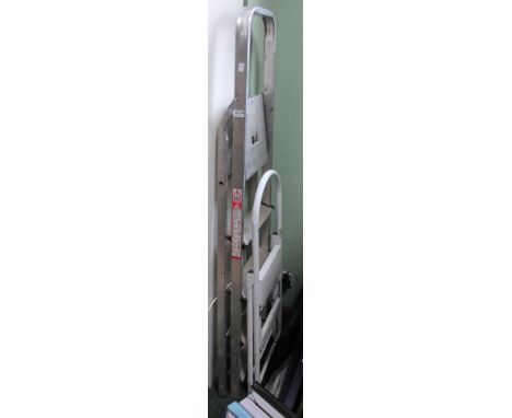 Two sets of step ladders