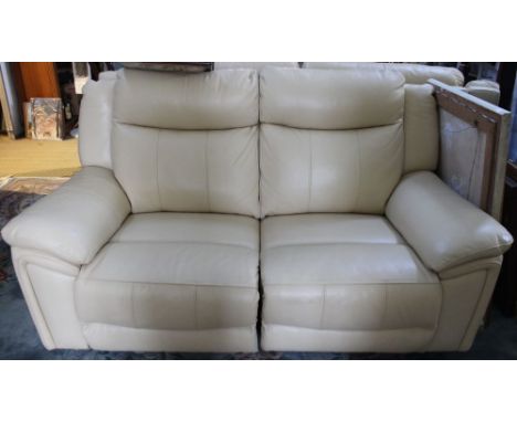 A cream leather two seater electric recliner sofa