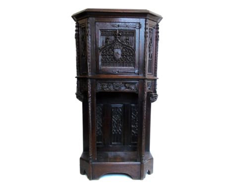 Victorian copy of a 16th century continental standing cupboard, oak construction with Gothic tracery panels, central cupboard