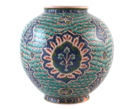 Persian Iznik vase, painted with flowers within fish scales, 19th / early 20th century 29cm high