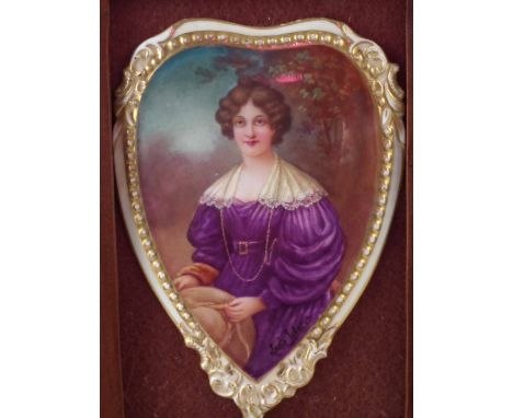 Leslie Johnson (Royal Doulton artist) porcelain plaque, of heart shape painted with a portrait of a lady, within pierced wood