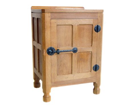 Robert "Mouseman" Thompson bedside locker, adzed top above single four panel door with wrought metal hinges and latch, interi