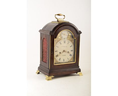 A late 19th century mahogany bracket clock by Kenneth Maclenan, London. With single pad top, brass carry handle, brass fish-s