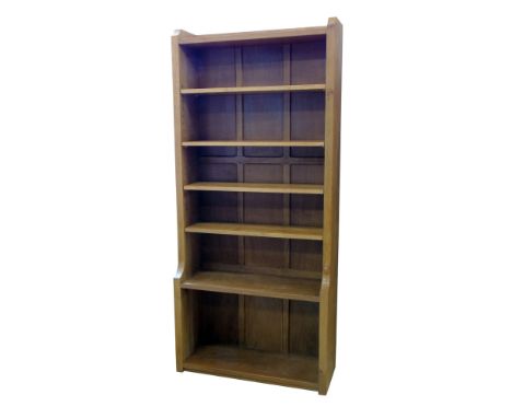 Robert "Mouseman" Thompson floor standing bookcase, fitted four adjustable shelves with fixed shelf to base, width 83cm (32")