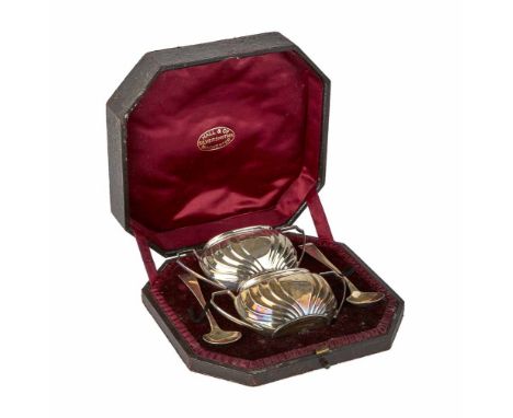 Pair of cased silver bon-bon dishes, chippendale border surrounds with pierced scrolling decoration, pedestal feet, weighing 