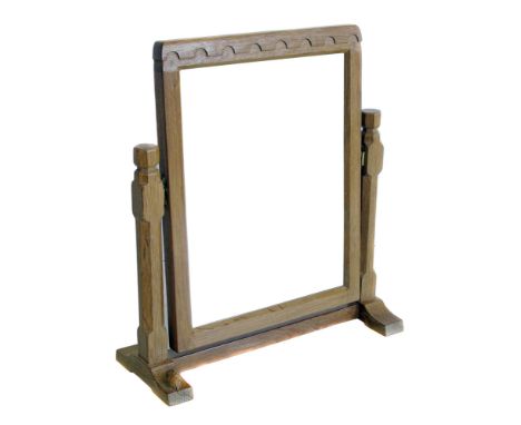 Robert "Mouseman" Thompson dressing table mirror, the oak frame supporting rectangular glass on twin pillar and trestle base,