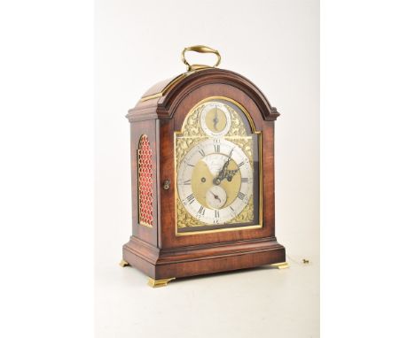 A mid 18th century mahogany bracket clock by Christopher Moon of London. With three pad top and brass carry handle, brass fis