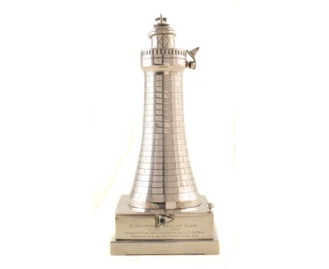 Silver presentation table lighter in the form of a lighthouse of sailing interest , 20cm high, square stepped base with prese