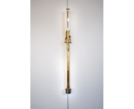 An early 20th century brass ships stick barometer by F. Darton & Co (Watford, England). With weighted bottom and brass gimble