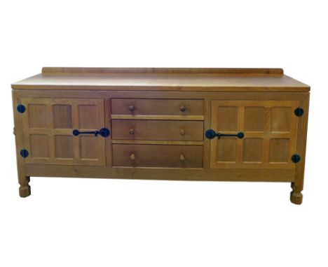 Robert "Mouseman" Thompson sideboard, rectangular adzed finished top with two six panel doors, fitted wrought metal hinges an