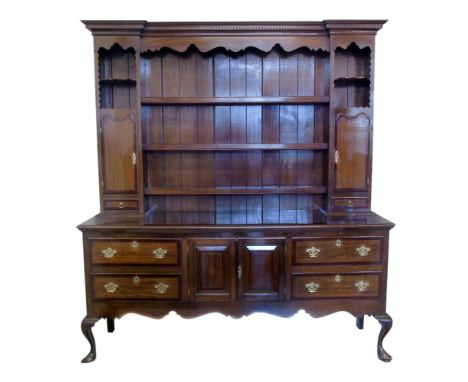 Victorian oak mahogany cross-banded North West regional dresser, inverted plate rack, dentil cornice, two cupboards above two
