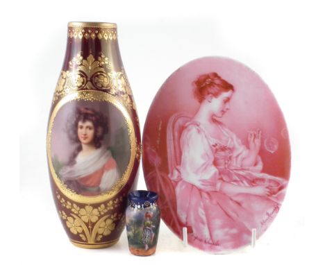 Vienna type vase signed Wagner, painted with a portrait of a lady within raised paste gilt work on a maroon ground, also an e