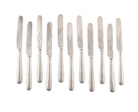 12 piece set of silver dessert knives and forks , filled silver handles chased with foliate and scrollwork, knives 21cm long,