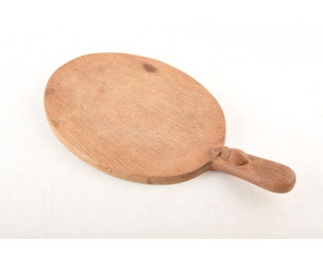 Robert "Mouseman" Thompson oval cheese board with single handle decorated with trademark mouse, 38cm (15") x 20cm (8").