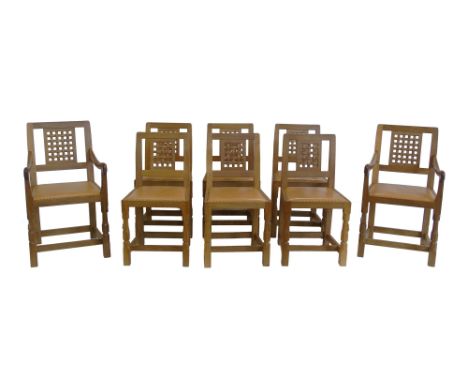 Robert "Mouseman" Thompson set of eight dining chairs comprising of six single and two open-arm carvers, each with tradition 