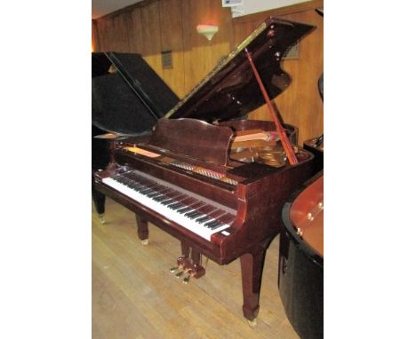 Elysian (c1989 )A 6ft 88-note grand piano in bright ebonised case on square tapered legs.