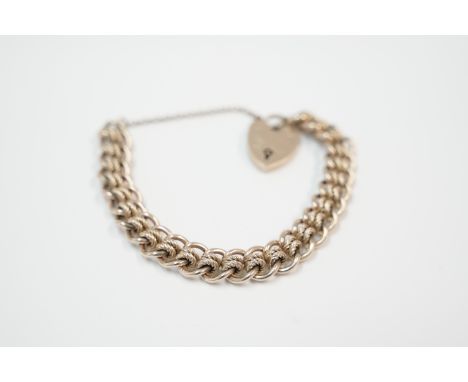 9ct yellow gold patterned rollerball style charm bracelet.&nbsp;&nbsp;Total item weight approximately 52.01 grams.