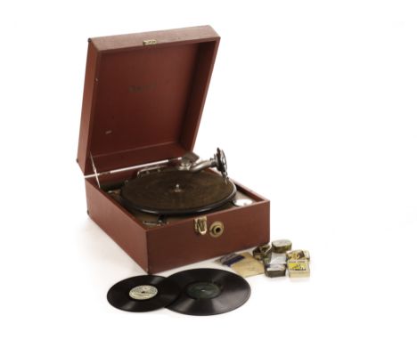 Portable gramophone: a Brunswick [Decca] portable gramophone in red case, 1954, now with Songster soundbox; approximately 60 