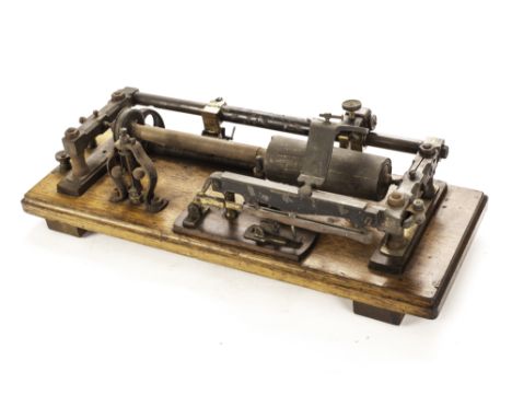 Phonograph: an early wax cylinder phonograph mechanism, of lacquered brass and iron or steel construction, with reproducer ar