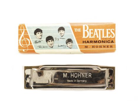 The Beatles: Original Hohner harmonica in box (NEMS, Circa 1964), Hohner took a regular harmonica and added a new Beatles lab