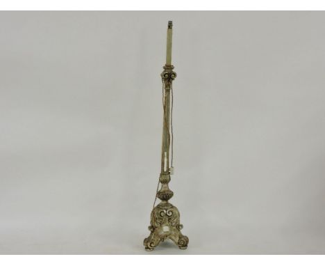A Florentine style silvered and carved wood standard lamp, 147cm high overall