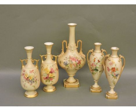 Two pairs and a single Royal Worcester blush ground vases, all decorated with floral bouquets, 22-29cm