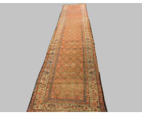A North West Persian runner, with a blue ground and triple guard stripes, 380 x 113cm, and another runner with a red ground a