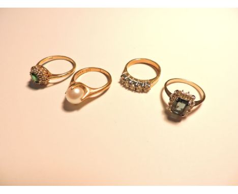 A 9ct gold synthetic spinel cluster ring, a gold single stone cultured pearl ring, and two costume jewellery rings