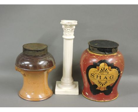 An unusual pottery tobacco jar and cover, with a painted cartouche, inscribed 'Shag', 24cm high, a stoneware tobacco jar and 