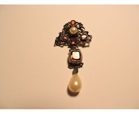 An Austro-Hungarian citrine and emerald brooch, decorated with green enamel and a replacement simulated pearl drop