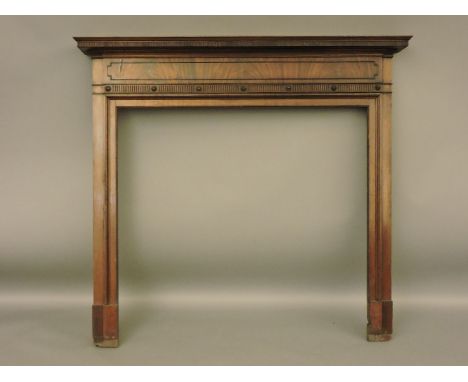 A mahogany fire surround, in the Georgian style
