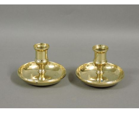 A brass 'Brighton Bun' campaign candlestick, unscrewing to reveal a pair of chamber sticks, 11cm diameter