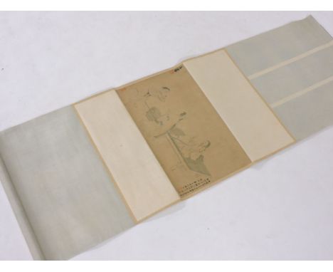 A Chinese hanging scroll, painted with two scholars and an attendant, inscribed, ink on silk