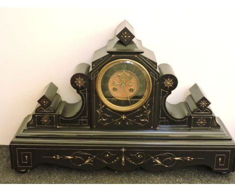 A late 19th century French black marble mantel clock, with gilt etched decoration, 62cm
